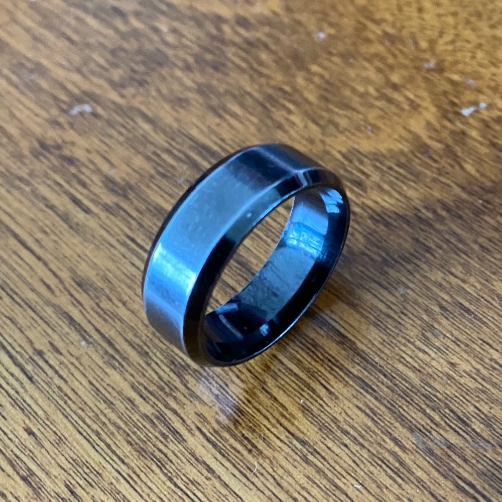 Mens wedding ring or similar type of Ring.